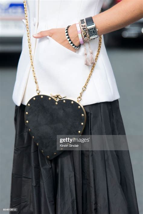 Fashion blogger Charlotte Groeneveld wears a Dior top, skirt and 